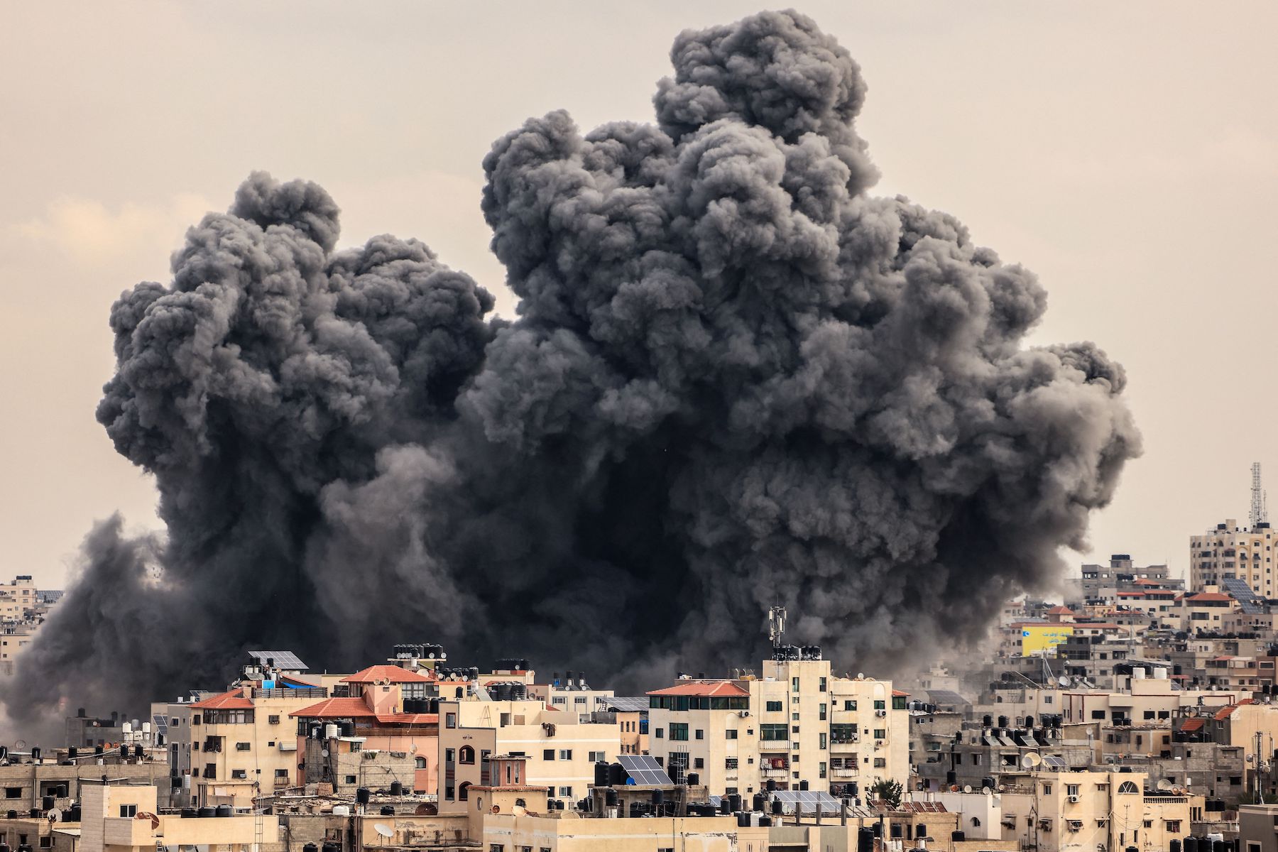 smoke rises in the sky of Gaza City during an Israeli airstrike