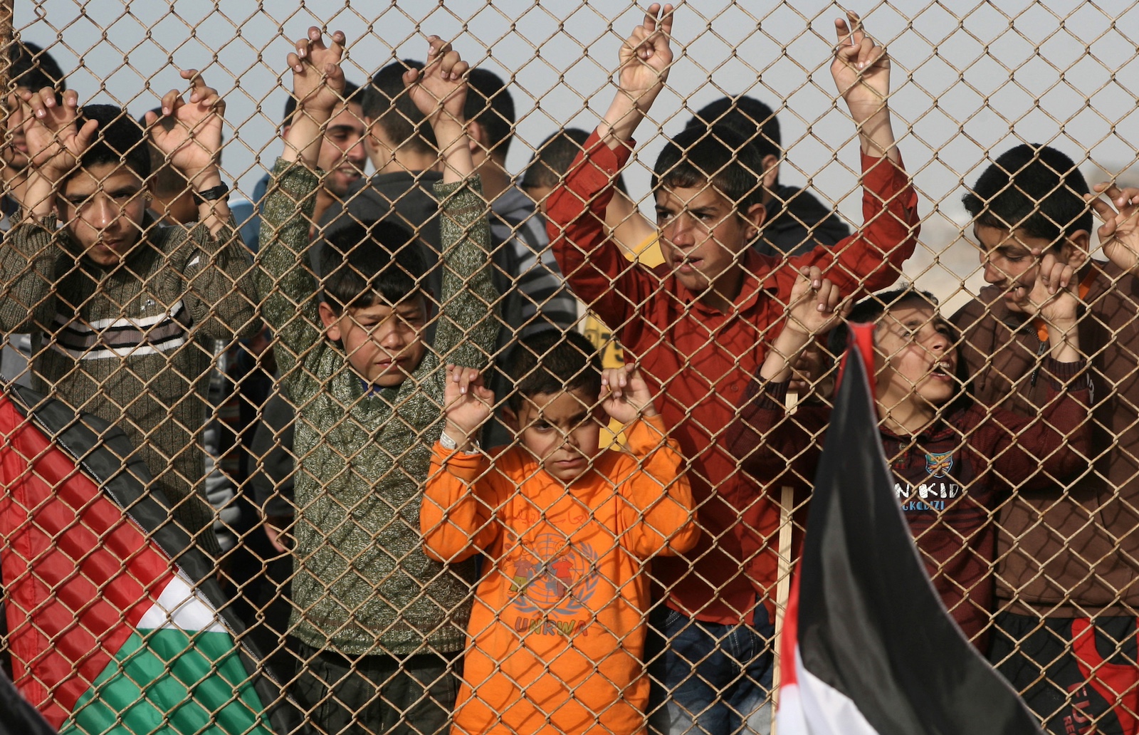 Palestinian children take part in a demonstration against the Israeli siege gaza