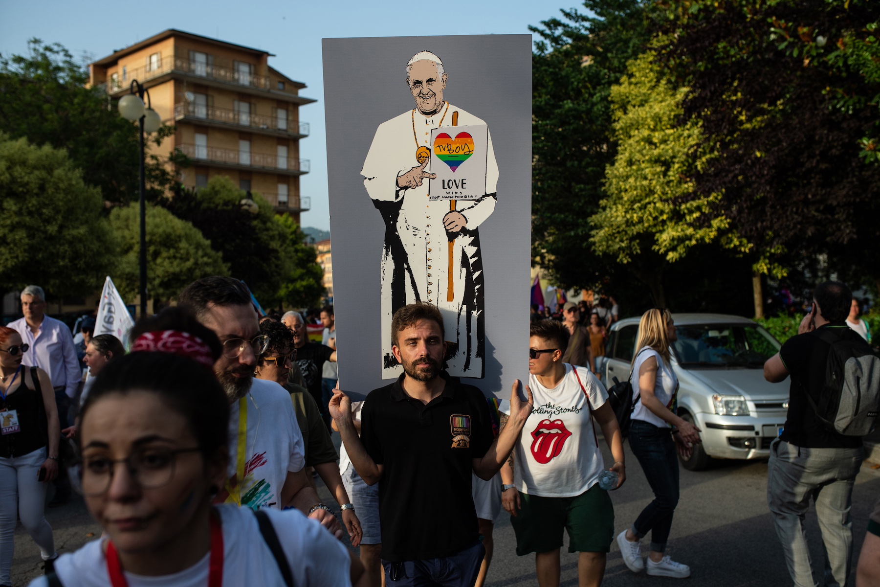 Pope Francis is drawn with a heart in the colors of the rainbow