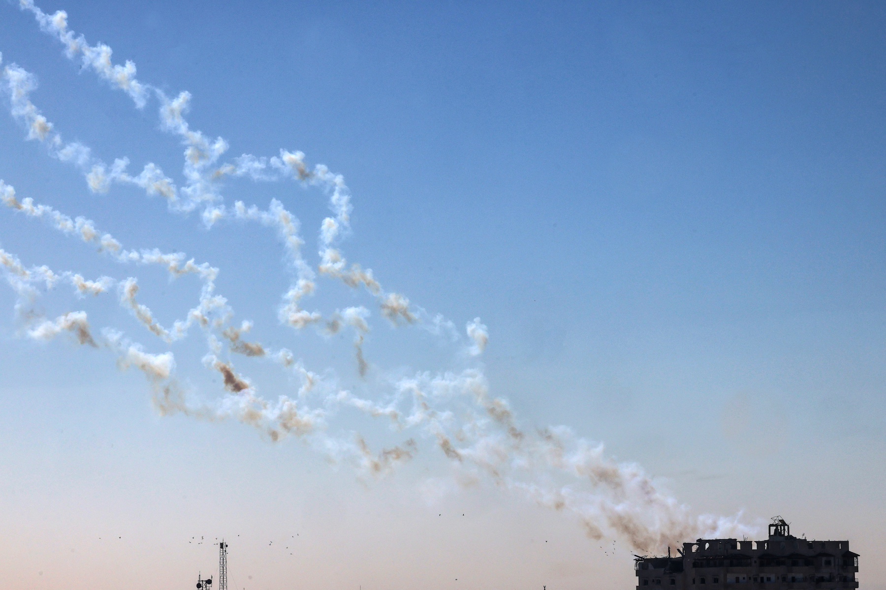 smoke of rockets fired from the Gaza Strip toward Israel