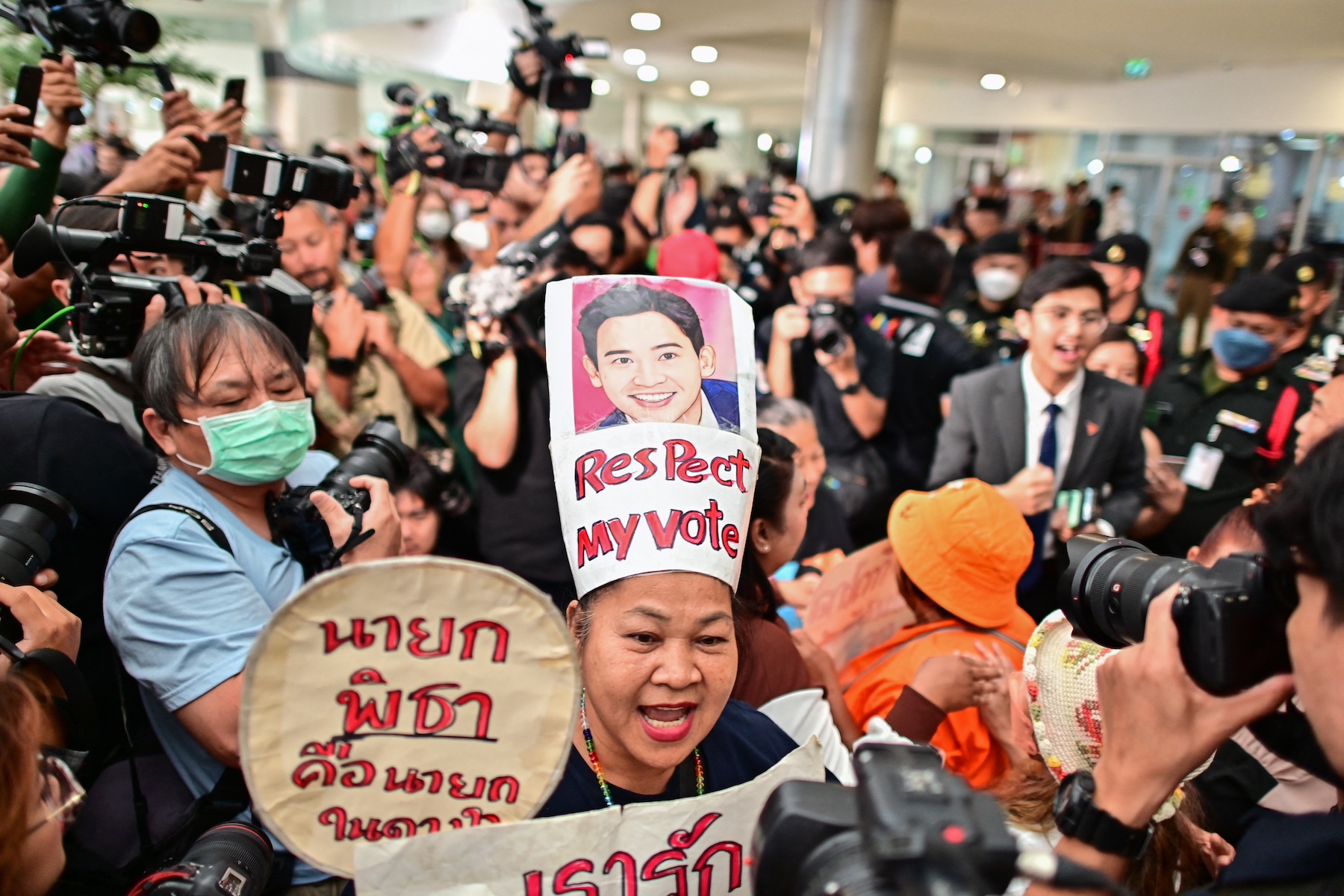 supporter of Pita Limjaroenrat celebrates Constitutional Court thailand