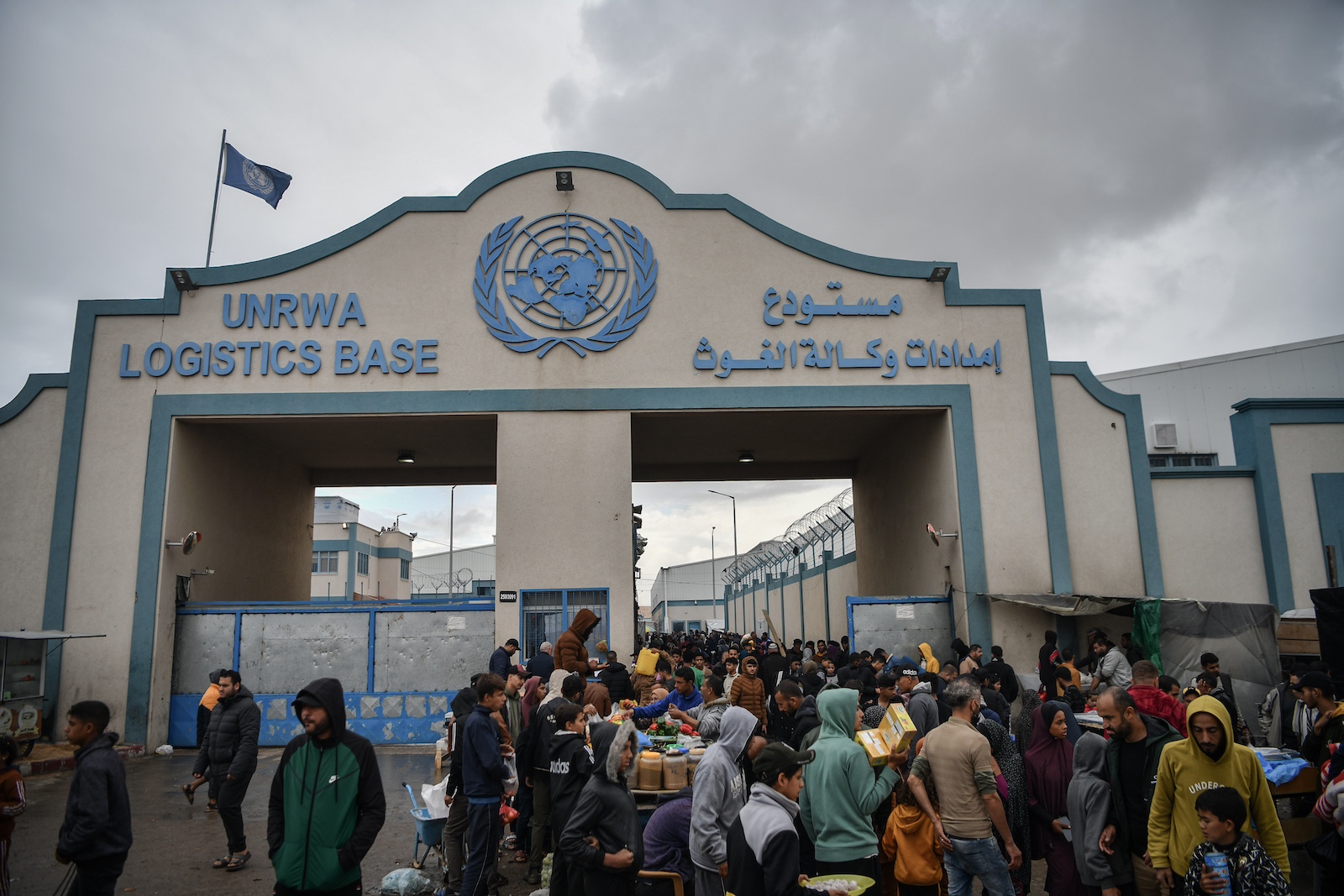Palestinian families take refuge logistics base UNRWA