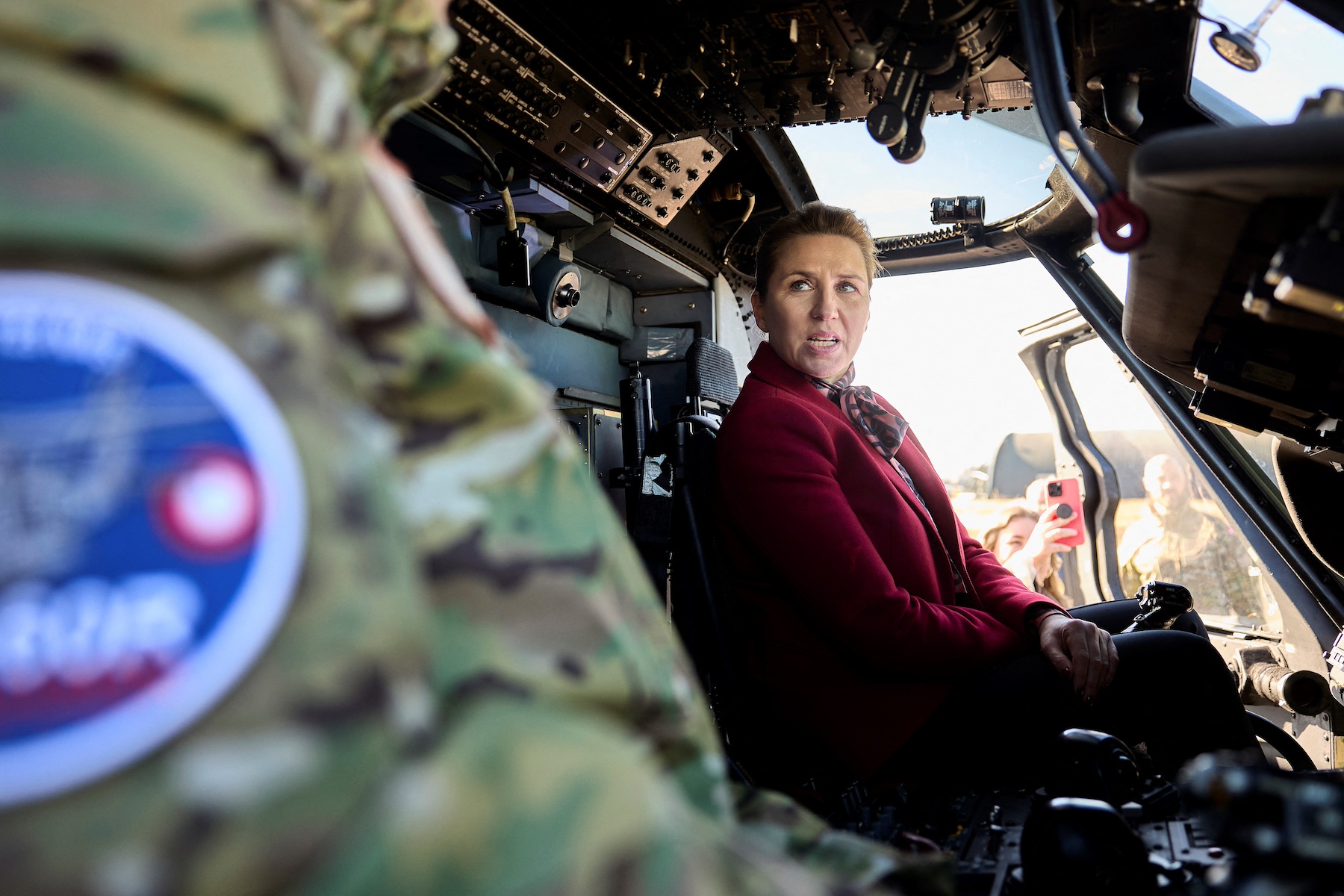 Danish Prime Minister Mette Frederiksen sits helicopter