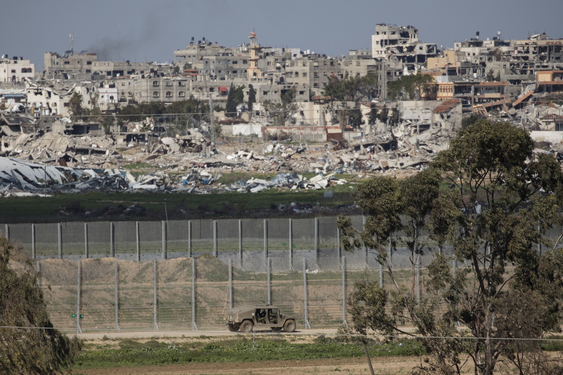 Israeli army vevicle moves along gaza border